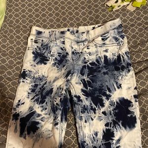 white and blue pattern jeans. size 10-12. brand jordache.